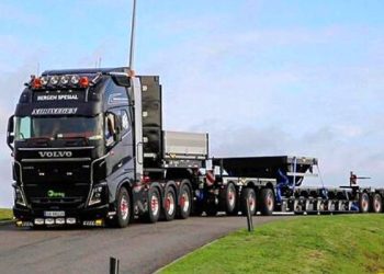 Volvo truck with many tyres