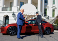 Trump and Elon Muck Pose With a Tesla