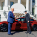 Trump and Elon Muck Pose With a Tesla